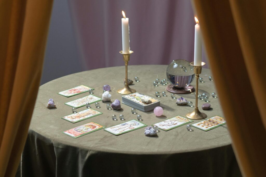 Reading table set with oracle cards and candles